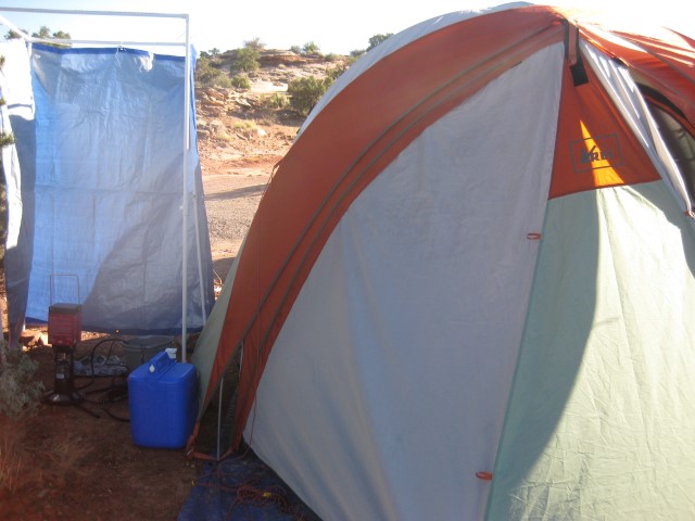 Our en-suite shower tent. We bought a gas heated shower in Denver, and with some poly water pipe and fittings made ourselves a shower tent.