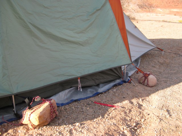 When we camped at Whites Canyon the ground was too hard for pegs, so we had to use rocks to hold the tent down during the night-time desert winds
