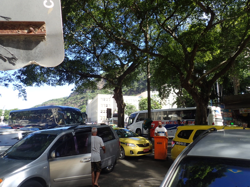 The chaos of Tour Buses, Taxis and cars at the base of the cable car to Sugarloaf Mountain