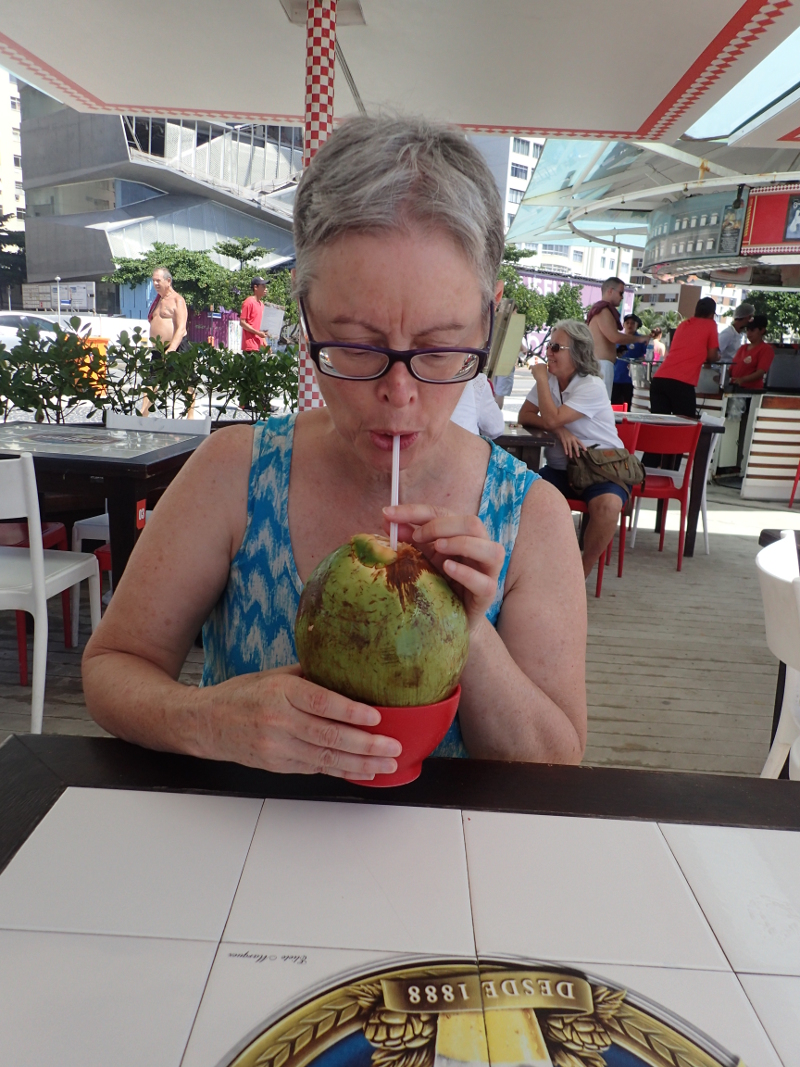 Judy drinking a Coconut