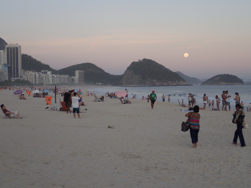 Moonrise and sunset on Copacabana Beach