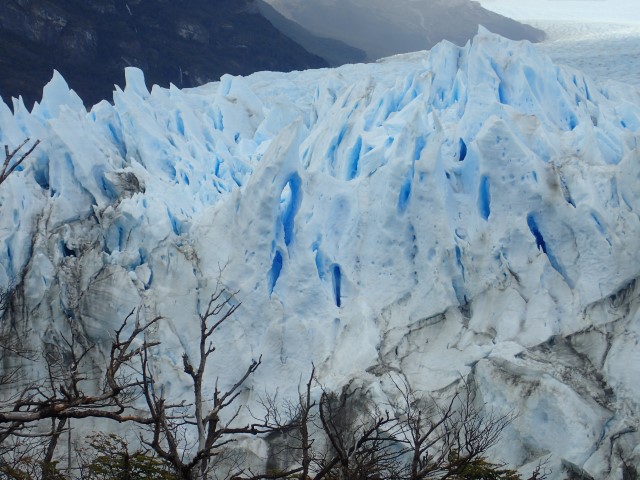 Perito Moreno Glacier closeup of blue ice and an hole